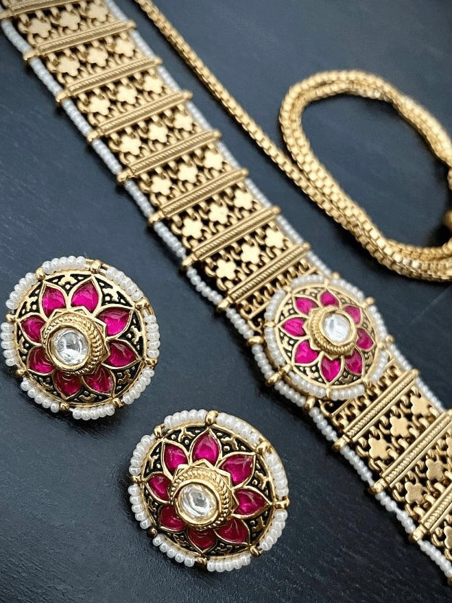 angled shot of gold chandanhaar choker with adjustable chain clasp